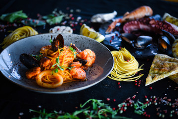 Naklejka na ściany i meble italian home made pasta with fresh seafood