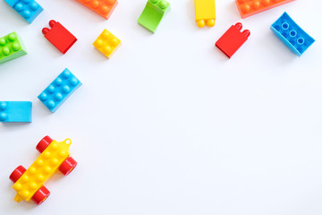 Plastic toy blocks on white background