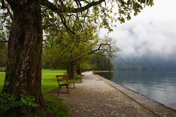 Germany, Lake Konigssee. Benches overlooking lake. 