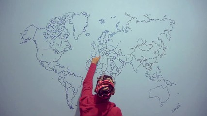 Young Lady Shows Point On World Map With Finger
