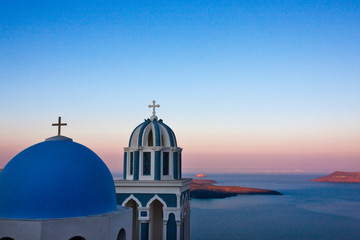 Church on the coast of Aegean Sea. Oia, Santorini Island, Greece.