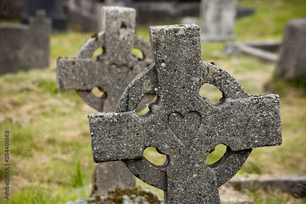 Sticker ireland, county mayo, achill island. celtic gravestone crosses with heart carving at kildownet cemet