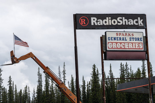 AUGUST 8 2018 - COPPER CENTER, AK: Sign for a Radio Shack store still in operation in Alaska on an overcast day
