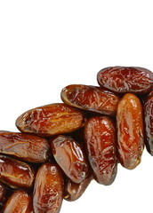 Dried dates over white background. Heap of dried dates isolated on white background.
