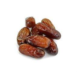 Dried dates over white background. Heap of dried dates isolated on white background.