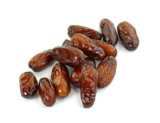 Dried dates over white background. Heap of dried dates isolated on white background.