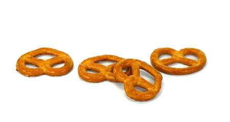Few pretzels on a white background.