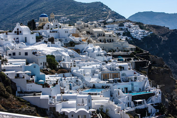 Oia, Island of Santorini, Greece. Village in Oia with blue domed Greek churches on the Caldera