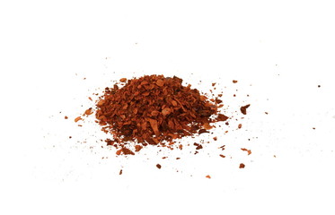 Cayenne pepper. Pile crushed red cayenne pepper, dried chili flakes and seeds isolated on white background