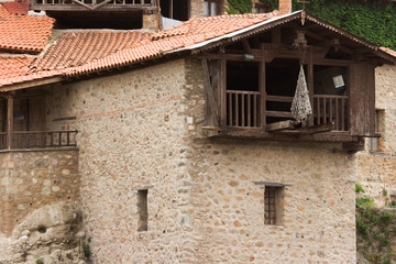 Greece, Meteora. Rope basket at Grand Meteora Monastery to raise supplies.