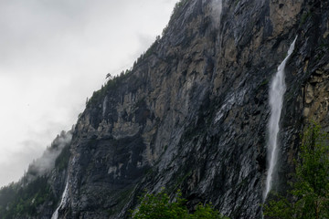 Fototapeta na wymiar Two Waterfalls on the cliff