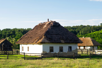 Fototapeta na wymiar Authentic Cossack farm in Ukraine, Stetsovka village. Ukrainian houses of the peasants