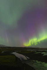 North Iceland, Near Akureyri. The northern lights glow in unbelievable colors.