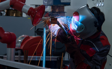 Welder erecting technical steel,Industrial steel welder in factory technical,Argon shielding...