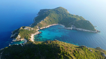 Fototapeta na wymiar Aerial drone photo of iconic paradise bay of Porto Timoni with tropical deep blue and turquoise clear sea, Corfu island, Ionian, Greece