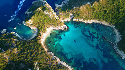 Aerial drone photo of tropical Caribbean bay with white sand beach and beautiful turquoise and sapphire clear sea