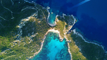 Aerial drone photo of tropical Caribbean bay with white sand beach and beautiful turquoise and sapphire clear sea