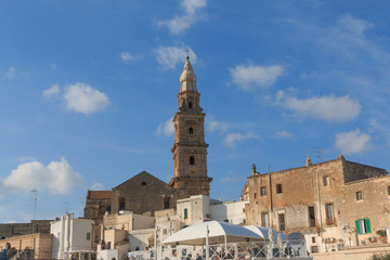 Fototapeta na wymiar Italy, Bari, Apulia, Monopoli. Bell tower of cathedral.