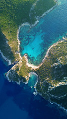 Naklejka na ściany i meble Aerial drone photo of iconic paradise bay of Porto Timoni with tropical deep blue and turquoise clear sea, Corfu island, Ionian, Greece