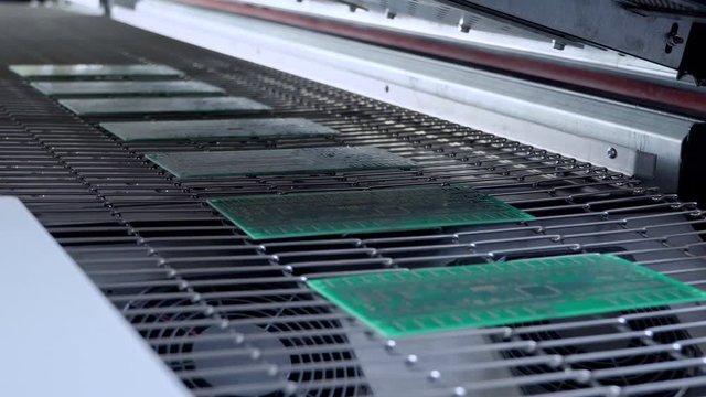 Print circuit board (pcb) on conveyor of SMT automatic pick and place machine for assembly electronic board