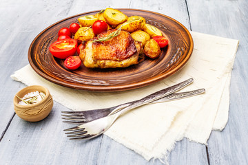 Roast chicken thighs and baby potatoes