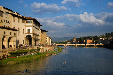 Fototapeta na wymiar Italy, Florence. Kayakers on River Arno. Florence, Italy. Credit as: Dennis Flaherty / Jaynes Gallery / DanitaDelimont. com