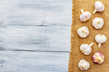 Fresh organic garlic on sackcloth