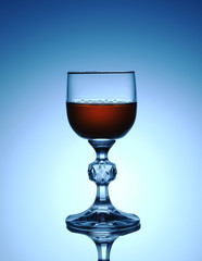  Brandy crystal glass on a blue background