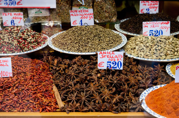 Venice, Veneto, Italy - Herbs and spices are on display for sale in bulk in an open air farmer's market.