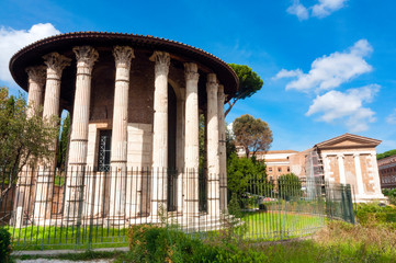 Fototapeta premium Temple of Hercules Victor, and Temple of Portunus or Temple of Fortuna Virilis, Piazza St. Maria in Cosmedin, Rome, Unesco World Heritage Site, Latium, Italy