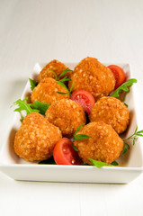 Arancini (deep-fried stuffed rice balls, Sicily)