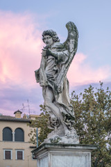 Italy, Rome, Angel Statue on Ponte Sant'Angelo at Sunset