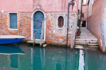 Home Entrance from Canal side. Venice. Italy.