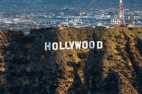 Morning aerial view of the famous Hollywood Sign in Griffith Park with Burbank in background on February 20, 2018 in Los Angeles, California, USA.