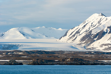 Norway. Svalbard. Spitsbergen. Forlandsundet. Mountains under the midnight sun.