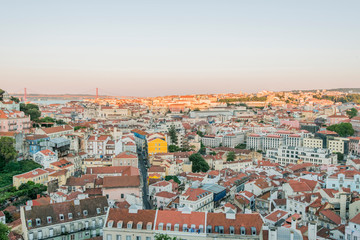 Fototapeta na wymiar Portugal, Lisbon, Rooftops of Lisbon at Sunrise Viewed from Graca