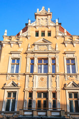 Fototapeta na wymiar Romania, Brasov, Council Square, Piata Sfatului ornamental decorated buildings near square.