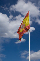 Spain, Madrid. Columbus Square, Spain's flag.