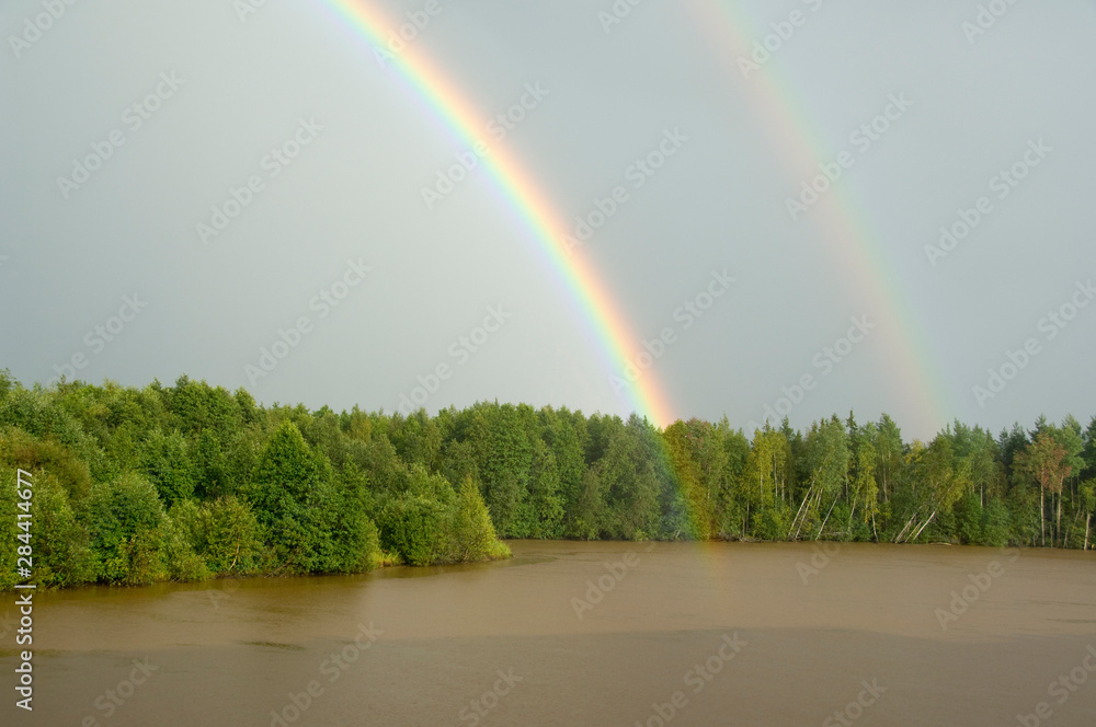 Sticker Russia, Typical river views between Goritzy & Kizhi Island. White Lake area, double rainbow over the forest.