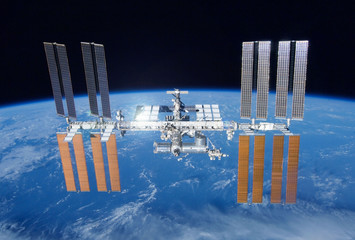 International Space Station over the planet. Elements of this image were furnished by NASA