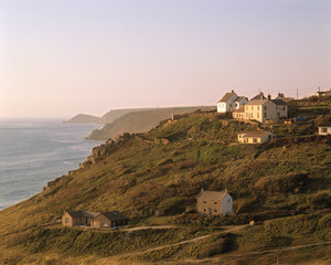 England, Land's End. The houses at Land's End in Cornwall, England, face the sunset on the Celtic...