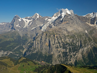 Switzerland, Bern Canton, Birg gondola station, view of Eiger, Monk, and Jungfrau, with Murren