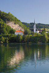 Fototapeta na wymiar Church on shoreline of Lake Bled, Bled, Slovenia