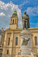 Fototapeta na wymiar Croatia, Zagreb. Statue and Serbian Orthodox Cathedral. 