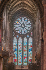 UK, Scotland, Orkney Island, Kirkwall. St. Magnus Cathedral stained glass completed in the 12th century when Orkney was part of the Kingdom of Norway