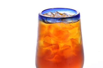 Blue Rimmed Glass Of Iced Tea On White Background.