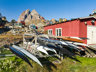 Kayak on rack belonging t the local kayak club. Small town of Uummannaq, northwest Greenland. © Martin Zwick/Danita Delimont