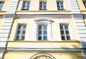 Fototapeta na wymiar Yellow front of classic building background hd