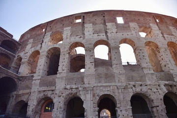 Obraz premium Rome, Italy - June 2019 - Colosseum in Rome. Colosseum is the most landmark in Rome. Huge Roman amphitheatre.