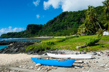 Fototapeta na wymiar Bay and turquoise water in Tau Island, Manu'a, American Samoa, South Pacific
